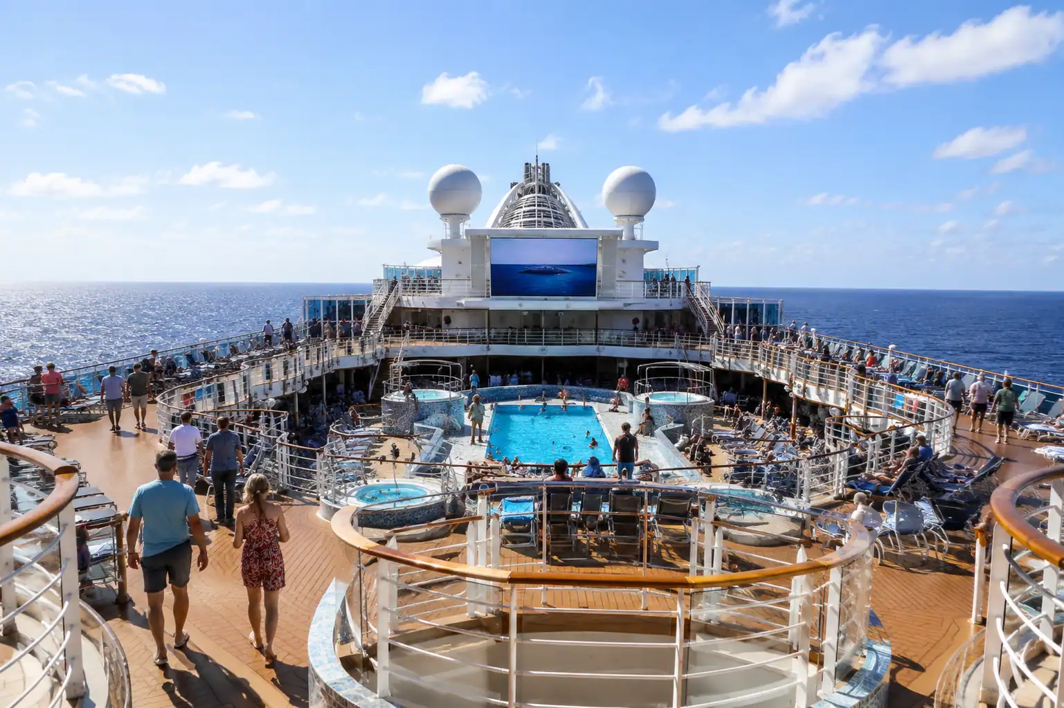 First time cruisers enjoying their first cruise vacation on a cruise ship deck